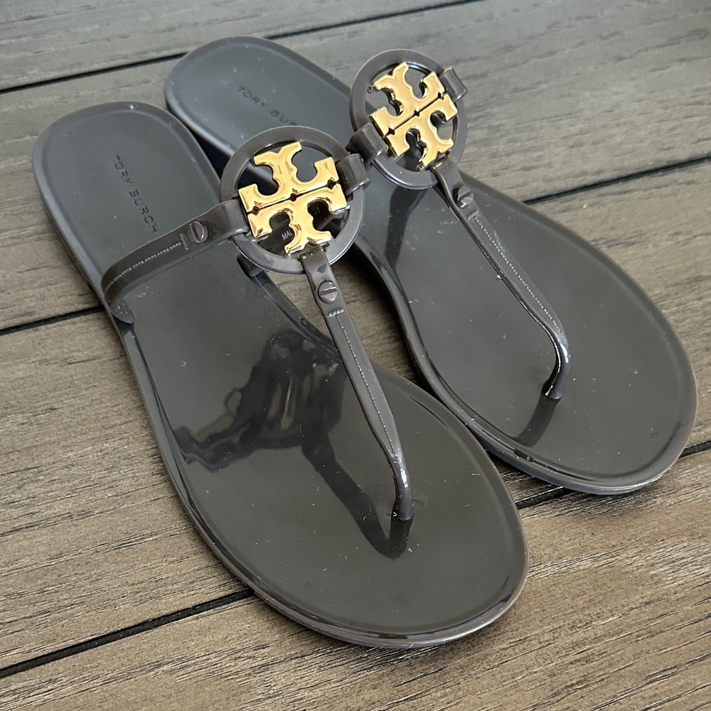 Tory Burch purplish/brown and Gold Flip Flops